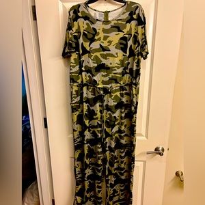 One piece short sleeve Camo jumpsuit with a drawstring waist